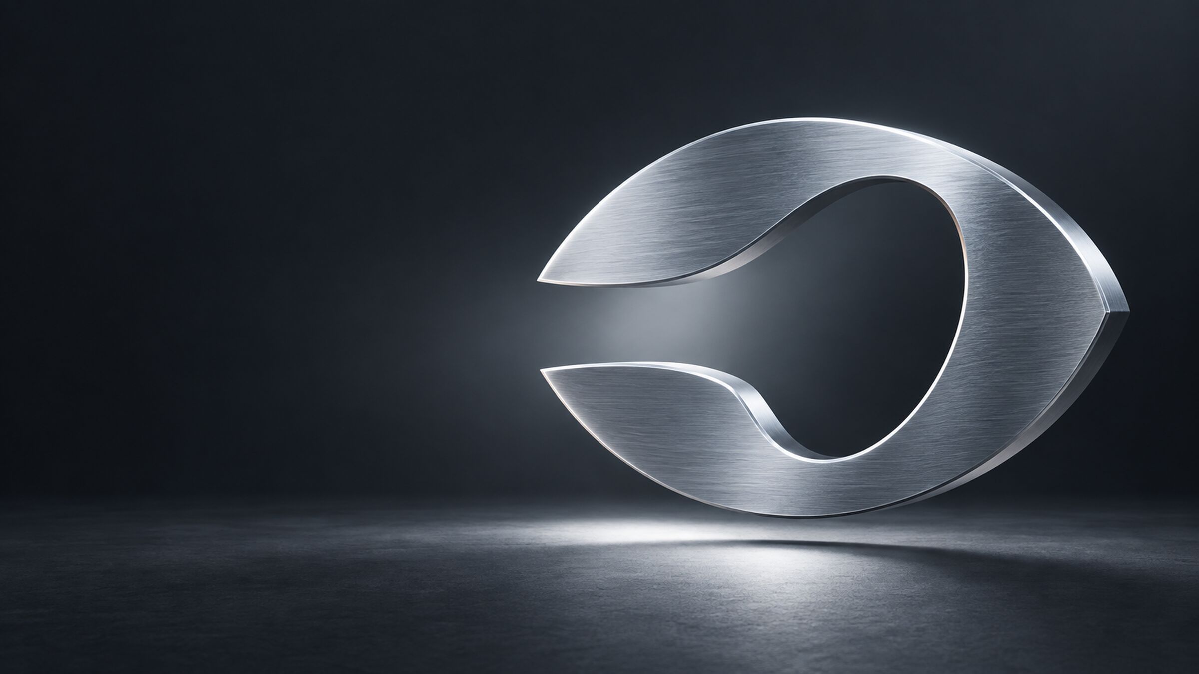 The Quant mark, an open aperture shaped like an eye, in brushed aluminum on a dark stage.